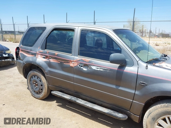 2006 Mercury Mariner Convenience with VIN 4M2YU56ZX6DJ04338, listed as a IAAI auction lot 42564945 with 99,570 mi miles and . Bid and sale history available at DreamBid. Image 12.