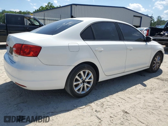 2011 Volkswagen Jetta SE with VIN 3VWDZ7AJ0BM052023, listed as a Copart auction lot 59148675 with 132,303 mi miles and Salvage title. Bid and sale history available at DreamBid. Image 3.