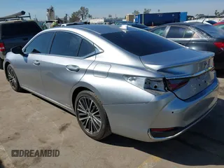 2022 Lexus ES 300h with VIN 58ADA1C15NU026087, listed as a IAAI auction lot 41765304 with 20,795 mi miles and . Bid and sale history available at DreamBid. Image 3.