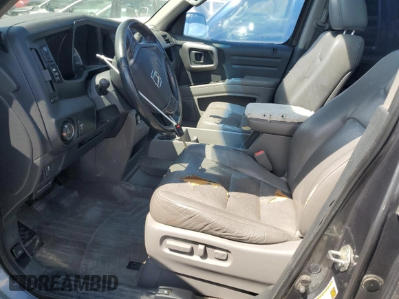 2012 Honda Ridgeline RTL with VIN 5FPYK1F58CB452281, listed as a Copart auction lot 54279455 with 189,314 mi miles and Salvage title. Bid and sale history available at DreamBid. Image 7.