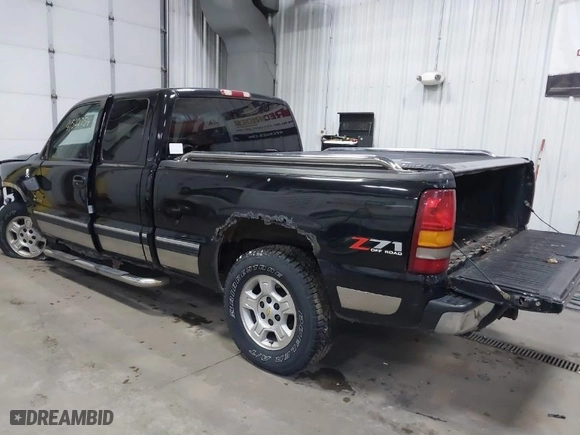 2001 Chevrolet Silverado 1500 LS with VIN 2GCEK19T211104966, listed as a IAAI auction lot 41522754 with 240,384 mi miles. Bid and sale history available at carsss.com. Image 3.