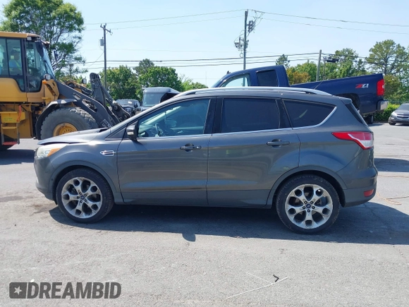 2015 Ford Escape Titanium with VIN 1FMCU0J94FUB24350, listed as a IAAI auction lot 42065641 with 168,215 mi miles. Bid and sale history available at carsss.com. Image 14.