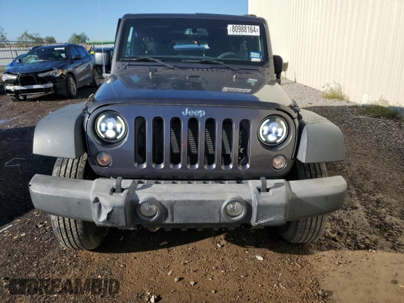 2016 Jeep Wrangler Unlimited Sport with VIN 1C4BJWDG4GL210206, listed as a Copart auction lot 80988164 with 101,544 mi miles and Salvage Title. Bid and sale history available at DreamBid. Image 5.