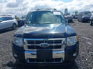 2011 Ford Escape Hybrid with VIN 1FMCU5K37BKA22327, listed as a IAAI auction lot 41906927 with 135,027 mi miles. Bid and sale history available at carsss.com. Image 12.