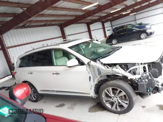2015 Infiniti QX60 with VIN 5N1AL0MM3FC510791, listed as a IAAI auction lot 42225199 with 97,588 mi miles and . Bid and sale history available at DreamBid. Image 14.