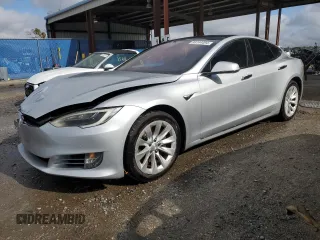 2017 Tesla Model S 60 with VIN 5YJSA1E13HF193206, listed as a Copart auction lot 86144494 with 160,157 mi miles and Salvage title. Bid and sale history available at DreamBid. Image 1.