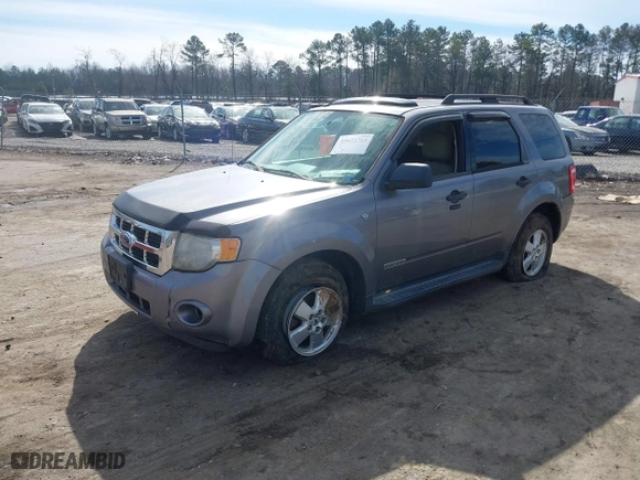 2008 Ford Escape XLT with VIN 1FMCU03178KA47527, listed as a IAAI auction lot 41672719 with 306,312 mi miles. Bid and sale history available at carsss.com. Image 2.