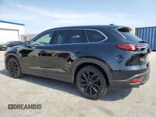 2023 Mazda CX-9 Touring Plus with VIN JM3TCBAY3P0657042, listed as a Copart auction lot 56391575 with 49,780 mi miles and Clean title. Bid and sale history available at DreamBid. Image 2.