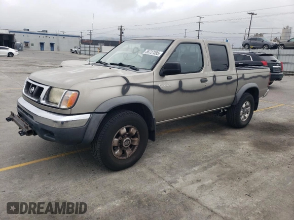 2000 Nissan Frontier XE with VIN 1N6ED27T8YC357939, listed as a Copart auction lot 55727395 with 143,842 mi miles and Salvage title. Bid and sale history available at DreamBid. Image 1.