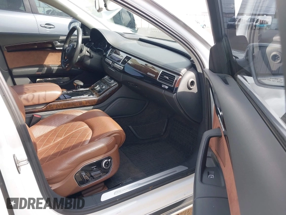 2015 Audi A8 4.0T with VIN WAU32AFD6FN039739, listed as a IAAI auction lot 41946401 with 102,668 mi miles and . Bid and sale history available at DreamBid. Image 5.