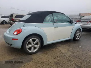 2010 Volkswagen Beetle with VIN 3VWRG3AL7AM006001, listed as a Copart auction lot 56973285 with Not provided miles and Salvage title. Bid and sale history available at DreamBid. Image 3.
