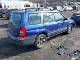 2003 Subaru Forester X with VIN JF1SG63633H748955, listed as a IAAI auction lot 41681834 with 236,196 mi miles. Bid and sale history available at carsss.com. Image 4.