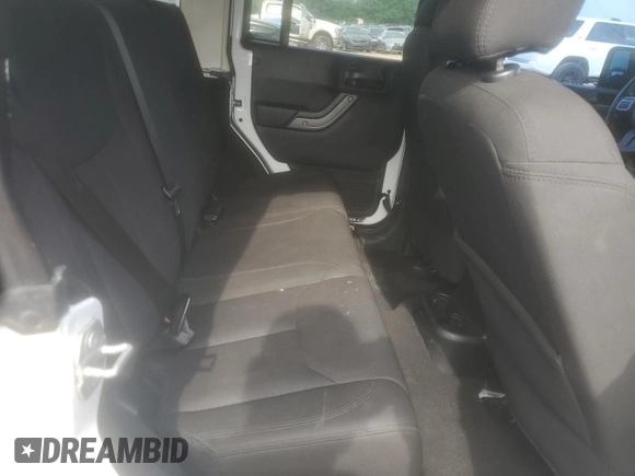 2017 Jeep Wrangler Unlimited Sport with VIN 1C4BJWDG6HL709901, listed as a Copart auction lot 55262645 with 100,887 mi miles and Salvage title. Bid and sale history available at DreamBid. Image 11.