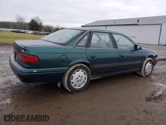 1995 Ford Taurus GL with VIN 1FALP52U1SA108202, listed as a Copart auction lot 85676434 with 102,669 mi miles and Salvage title. Bid and sale history available at DreamBid. Image 3.