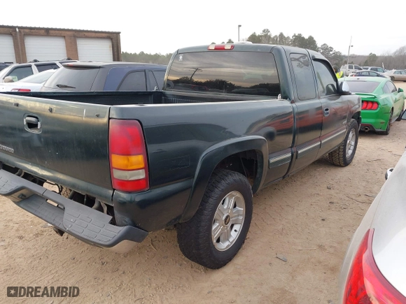 2002 Chevrolet Silverado 1500 LS with VIN 1GCEK19TX2E298985, listed as a IAAI auction lot 41459560 with 123,180 mi miles. Bid and sale history available at carsss.com. Image 4.
