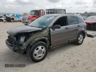 2011 Honda CR-V LX z VIN 3CZRE3H39BG704585, wystawiony jako Copart lot #57511805 z przebiegiem 95 542 mil mil oraz Szkoda całkowita • Salvage title. Historia ofert i sprzedaży dostępna na DreamBid. Obrazek 1.