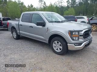 2023 Ford F-150 XL with VIN 1FTEW1C88PKD35338, listed as a IAAI auction lot 41924335 with 51,515 mi miles. Bid and sale history available at carsss.com. Image 1.