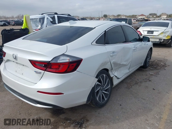 2020 Honda Insight Touring with VIN 19XZE4F90LE009301, listed as a IAAI auction lot 41661665 with 73,673 mi miles and . Bid and sale history available at carsss.com. Image 4.