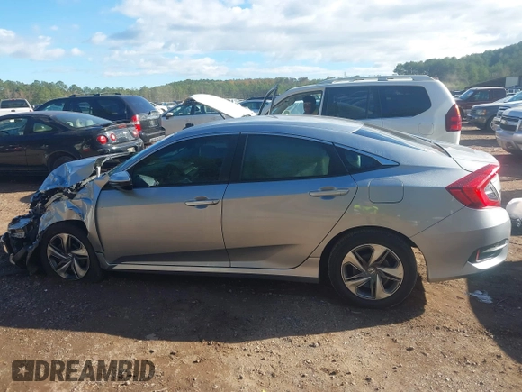 2020 Honda Civic LX z VIN 2HGFC2F60LH549739, wystawiony jako IAAI lot #40922240 z przebiegiem 127 958 mil mil oraz . Historia ofert i sprzedaży dostępna na DreamBid. Obrazek 14.