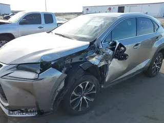 2015 Lexus NX 200t with VIN JTJBARBZ2F2002932, listed as a IAAI auction lot 41797857 with 205,902 mi miles and . Bid and sale history available at DreamBid. Image 6.