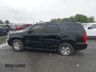 2013 Chevrolet Tahoe LS with VIN 1GNSCAE07DR223062, listed as a IAAI auction lot 41948276 with 196,616 mi miles and . Bid and sale history available at DreamBid. Image 14.