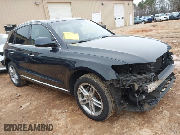 2017 Audi Q5 Premium with VIN WA1C2AFP5HA091896, listed as a IAAI auction lot 41553610 with 124,553 mi miles. Bid and sale history available at carsss.com. Image 1.