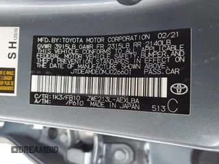 2021 Toyota Corolla Hybrid LE with VIN JTDEAMDE0MJ026601, listed as a IAAI auction lot 41797452 with 85,294 mi miles. Bid and sale history available at carsss.com. Image 9.