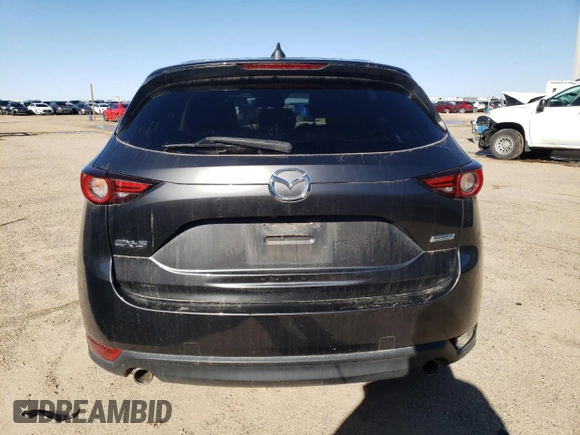 2018 Mazda CX-5 Grand Touring with VIN JM3KFADM6J0339204, listed as a Copart auction lot 48153655 with 85,900 mi miles and Clean Title. Bid and sale history available at DreamBid. Image 6.