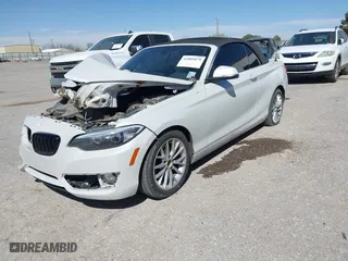 2015 BMW 2 Series 228i with VIN WBA1K5C50FV474011, listed as a IAAI auction lot 41805879 with 83,489 mi miles. Bid and sale history available at carsss.com. Image 16.