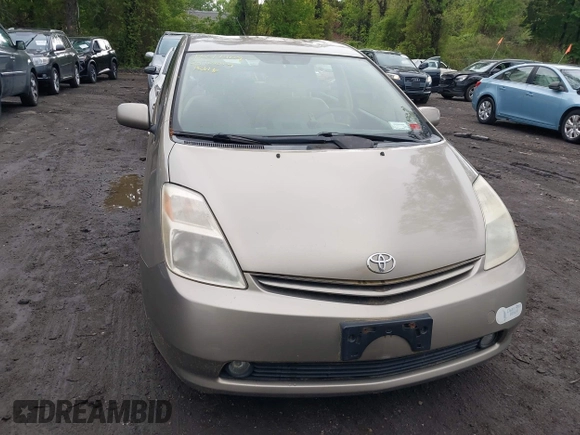 2004 Toyota Prius with VIN JTDKB20U240111589, listed as a IAAI auction lot 42217409 with 163,199 mi miles and . Bid and sale history available at DreamBid. Image 6.