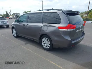2011 Toyota Sienna XLE AAS with VIN 5TDYK3DC3BS059501, listed as a IAAI auction lot 42185225 with 143,416 mi miles. Bid and sale history available at carsss.com. Image 3.