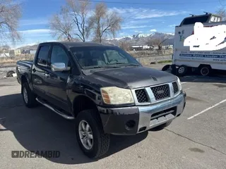 2004 Nissan Titan LE with VIN 1N6AA07A84N590583, listed as a Copart auction lot 49112705 with 92,426 mi miles and Salvage Title. Bid and sale history available at carsss.com. Image 1.