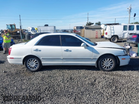 2005 Hyundai XG z VIN KMHFU45E85A386500, wystawiony jako IAAI lot #41658161 z przebiegiem 181 578 mil mil oraz . Historia ofert i sprzedaży dostępna na DreamBid. Obrazek 13.