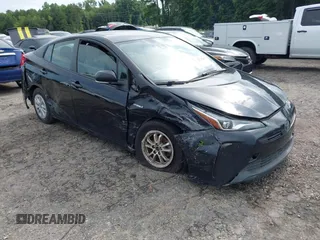 2019 Toyota Prius L Eco with VIN JTDKARFUXK3091445, listed as a IAAI auction lot 42728241 with 96,895 mi miles and . Bid and sale history available at DreamBid. Image 1.