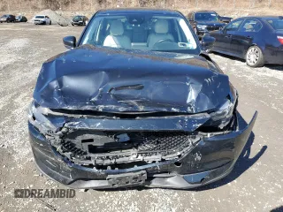2017 Mazda CX-5 Grand Touring with VIN JM3KFBDL6H0211374, listed as a Copart auction lot 49079775 with 142,164 mi miles and Salvage Title. Bid and sale history available at carsss.com. Image 5.