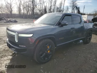 2022 Rivian R1T Adventure Package with VIN 7FCTGAAAXNN005667, listed as a Copart auction lot 44321435 with 48,249 mi miles and Salvage Title. Bid and sale history available at carsss.com. Image 1.