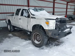2015 Ford Super Duty F-250 SRW Lariat with VIN 1FT7W2BT9FEC51353, listed as a IAAI auction lot 41565239 with 140,000 mi miles. Bid and sale history available at carsss.com. Image 1.