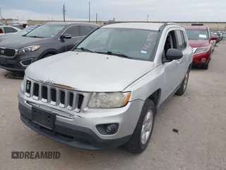 2013 Jeep Compass Sport with VIN 1C4NJCBA7DD100332, listed as a IAAI auction lot 41278779 with 161,668 mi miles. Bid and sale history available at carsss.com. Image 2.