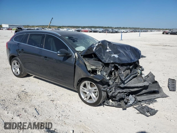 2015 Volvo V60 T5 Drive-E Premier with VIN YV140MEK7F1251940, listed as a Copart auction lot 73695834 with 143,663 mi miles and Salvage Title. Bid and sale history available at carsss.com. Image 4.