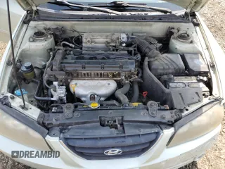 2004 Hyundai Elantra GLS z VIN KMHDN46D14U861749, wystawiony jako Copart lot #52625215 z przebiegiem 130 063 mil mil oraz Szkoda całkowita • Salvage title. Historia ofert i sprzedaży dostępna na DreamBid. Obrazek 11.