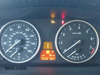 2009 BMW 5 Series 528i with VIN WBANU53589C120488, listed as a IAAI auction lot 41828723 with 178,159 mi miles and . Bid and sale history available at carsss.com. Image 7.