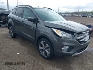 2017 Ford Escape SE with VIN 1FMCU9GD4HUE45193, listed as a IAAI auction lot 42055861 with 154,961 mi miles and . Bid and sale history available at DreamBid. Image 1.