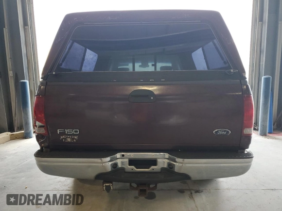 2001 Ford F-150 XL with VIN 1FTRX17W71NA45086, listed as a Copart auction lot 54182945 with 173,998 mi miles and Salvage title. Bid and sale history available at DreamBid. Image 6.