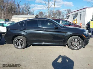 2019 BMW X6 xDrive35i with VIN 5UXKU2C50K0Z62820, listed as a IAAI auction lot 41006008 with 79,104 mi miles. Bid and sale history available at carsss.com. Image 13.