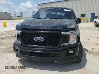 2018 Ford F-150 XL with VIN 1FTEW1E57JFC39493, listed as a Copart auction lot 61781395 with 129,871 mi miles and Salvage title. Bid and sale history available at DreamBid. Image 13.