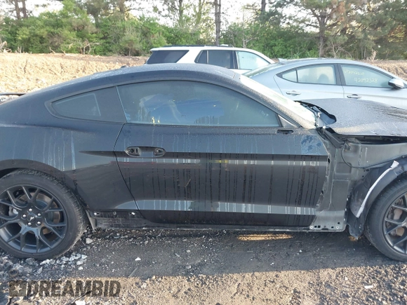 2019 Ford Mustang EcoBoost z VIN 1FA6P8TH7K5180949, wystawiony jako IAAI lot #42093614 z przebiegiem 82 936 mil mil oraz . Historia ofert i sprzedaży dostępna na DreamBid. Obrazek 14.