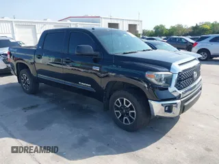 2018 Toyota Tundra SR5 z VIN 5TFDY5F13JX700630, wystawiony jako IAAI lot #41860316 z przebiegiem 99 404 mil mil oraz . Historia ofert i sprzedaży dostępna na DreamBid. Obrazek 1.
