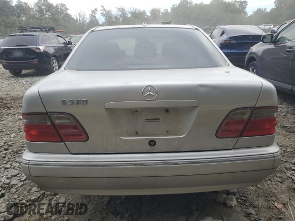 2001 Mercedes-Benz E-Class with VIN WDBJF65J71B201020, listed as a Copart auction lot 76067154 with 328,629 mi miles and Salvage Title. Bid and sale history available at carsss.com. Image 6.