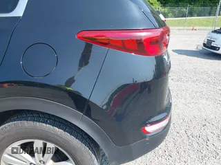 2017 Kia Sportage LX z VIN KNDPMCAC1H7285906, wystawiony jako IAAI lot #42399031 z przebiegiem 142 909 mil mil oraz . Historia ofert i sprzedaży dostępna na DreamBid. Obrazek 6.
