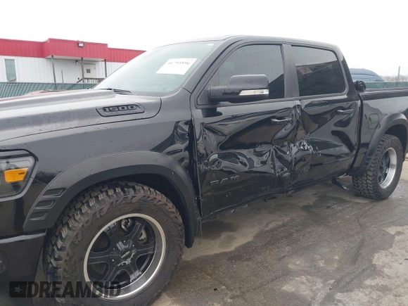 2022 Ram 1500 Big Horn with VIN 1C6SRFFT3NN287385, listed as a IAAI auction lot 41793596 with 12,277 mi miles and . Bid and sale history available at DreamBid. Image 6.